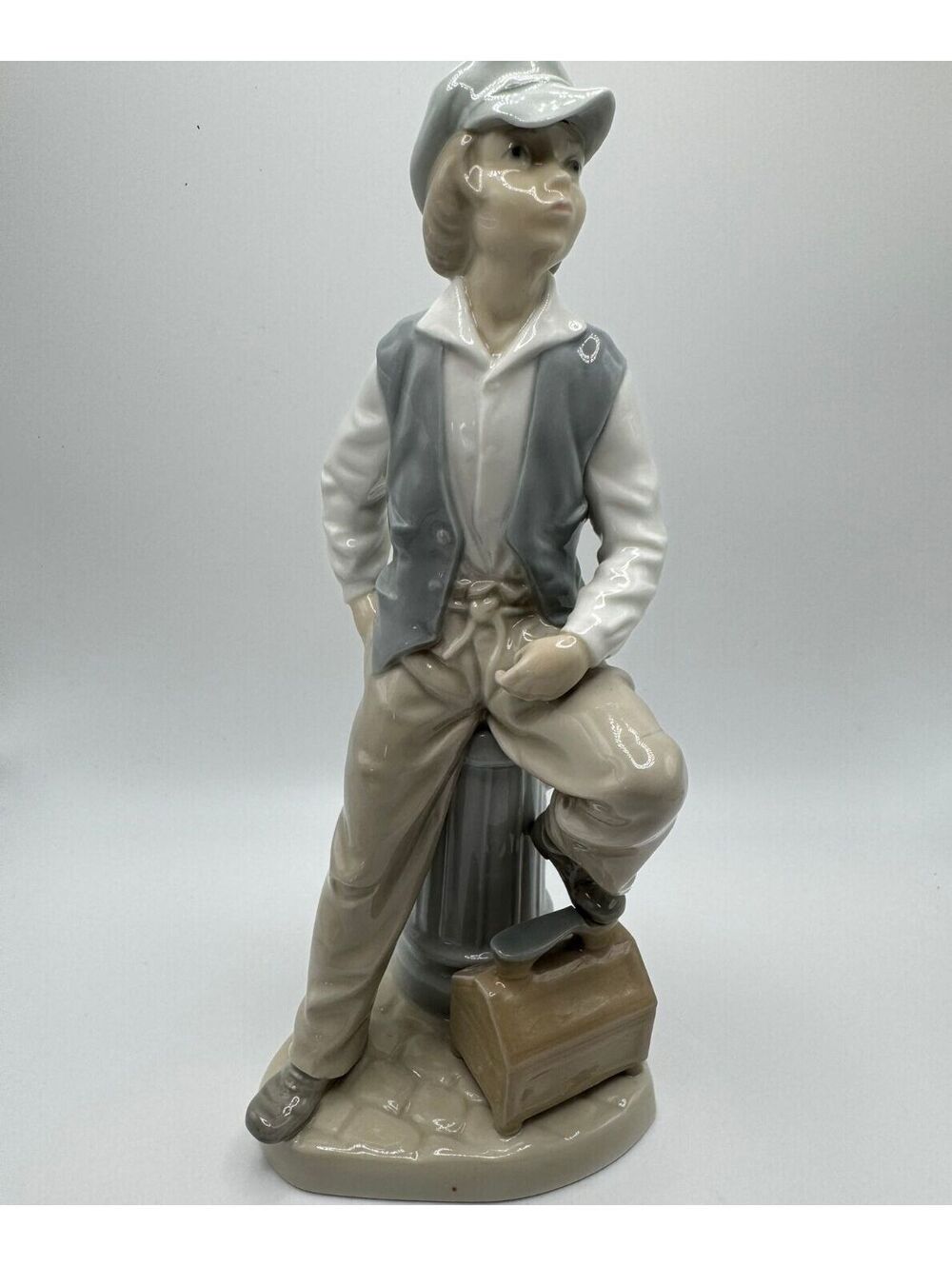 NAO by Lladro Model 2054 Shoe Shine Boy Porcelain Figurine Retired Made in Spain